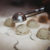 making pierogi scooping filling balls