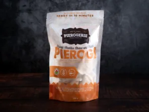 A bag of Cheddar Cheese and Potato Pierogi showing the front