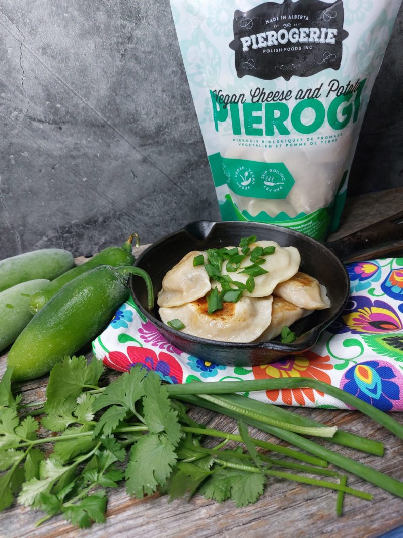 Jalapeño and Cheddar pierogi in a bag and on a cast iron frying pan